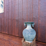 View of the home's cladding - View of wall, wood, wood stain, red, purple