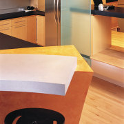 View of the kitchen area - View of countertop, floor, flooring, furniture, hardwood, interior design, kitchen, laminate flooring, product design, table, tile, wall, wood, wood flooring, orange