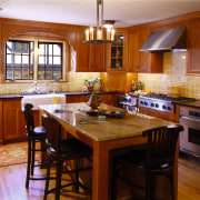 View of the kitchen area of the home cabinetry, countertop, cuisine classique, dining room, flooring, hardwood, interior design, kitchen, room, wood, wood flooring, brown