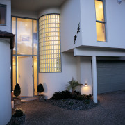 View of the entrance way - View of architecture, facade, home, house, interior design, lighting, property, real estate, window, black