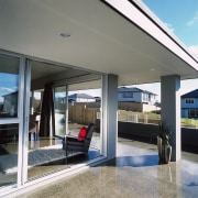 View of the outdoor living area - View door, house, interior design, real estate, window, gray