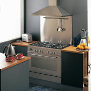 View of this kitchen with stainless steel cooker countertop, gas stove, home appliance, kitchen, kitchen appliance, kitchen stove, major appliance, product design, small appliance, black, gray