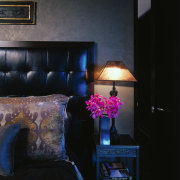 View of this living area - View of blue, darkness, furniture, home, house, interior design, lamp, light, light fixture, lighting, purple, room, table, black