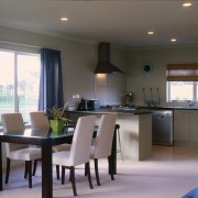 View of this dining &amp; kitchen area - countertop, dining room, interior design, kitchen, real estate, room, gray, black