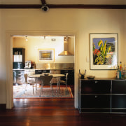 View of the kitchen &amp; casual dining area ceiling, dining room, floor, flooring, furniture, hardwood, home, interior design, living room, room, table, wood flooring, brown, black