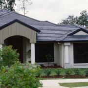 clsoe up of entrance way and roofing - cottage, facade, home, house, outdoor structure, property, real estate, residential area, roof, siding, window, gray, black