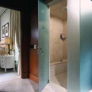 View of bathroom showing shower - View of bathroom, door, floor, glass, interior design, plumbing fixture, room, gray