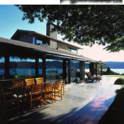 View of this home's patio - View of architecture, home, house, outdoor structure, real estate, black