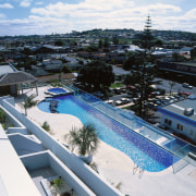 View of apartment swimming pool and spa with leisure, property, real estate, resort, swimming pool, water, white, black