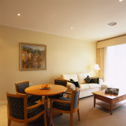 Dining and lounge area of apartment with round ceiling, interior design, living room, real estate, room, suite, orange, brown