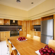 Apartment kitchen with timber cabinetry, large table in ceiling, floor, flooring, hardwood, interior design, kitchen, living room, real estate, room, wall, wood, wood flooring, orange