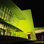 Night view of exterior of convention centre with architecture, building, convention center, corporate headquarters, daylighting, headquarters, metropolitan area, mixed use, night, performing arts center, structure, black