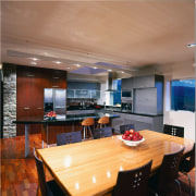 view of kitchen dining area showing a modern ceiling, countertop, dining room, interior design, kitchen, real estate, table, orange, brown