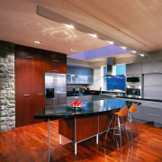 view of modern kitchen area - view of cabinetry, ceiling, countertop, floor, flooring, hardwood, interior design, kitchen, real estate, wood, wood flooring, red