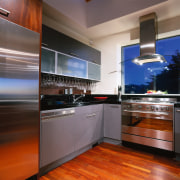 view of kitchen area sowing wood flooring, stainless apartment, cabinetry, countertop, hardwood, home, interior design, kitchen, property, real estate, room, under cabinet lighting, gray