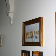 Hallway of older villa with light coloured walls, art gallery, exhibition, home, interior design, modern art, picture frame, gray