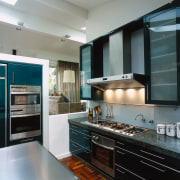 view of the kitchen cabinetry and cooking area cabinetry, countertop, cuisine classique, home appliance, interior design, kitchen, room, gray, black