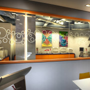 View of the office area, blue wall with interior design, gray