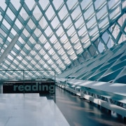 View of a reading room, white and black architecture, building, corporate headquarters, daylighting, daytime, fixed link, headquarters, line, metropolis, metropolitan area, structure, symmetry, gray, teal