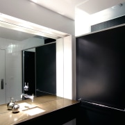 View of the bathroom, mirror, wooden vanity, black architecture, ceiling, glass, interior design, light fixture, lighting, product design, black, gray