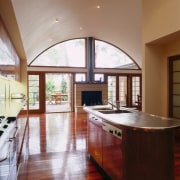 view from the kitchen looking into the dining/entertainment cabinetry, ceiling, countertop, cuisine classique, daylighting, estate, floor, flooring, hardwood, interior design, kitchen, laminate flooring, real estate, room, window, wood flooring, brown