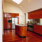 view of the kitchen area dshowing cabinetry, stainless architecture, cabinetry, ceiling, countertop, floor, flooring, hardwood, interior design, kitchen, laminate flooring, real estate, room, wood, wood flooring, red