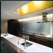 view of the kitchen with the screen doors ceiling, countertop, interior design, kitchen, light fixture, lighting, product design, sink, under cabinet lighting, gray, white