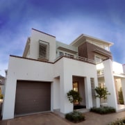 Exterior of house featuring red bricks with white architecture, building, elevation, estate, facade, home, house, official residence, property, real estate, residential area, roof, villa, window, gray, blue