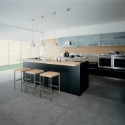 Kitchen with black cabinetry and light coloured benchtop, countertop, floor, flooring, interior design, kitchen, product design, tile, gray