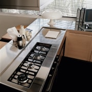 Closeup of kitchen benchtop with stainless steel top countertop, furniture, interior design, kitchen, product design, table, black, white