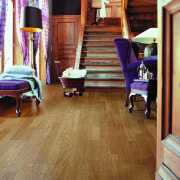 View of a stairway, wooden flooring and steps, chair, floor, flooring, furniture, hardwood, home, interior design, laminate flooring, living room, room, wood, wood flooring, brown