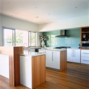 view of ktichen showing timber flooring and timber cabinetry, countertop, cuisine classique, floor, flooring, hardwood, interior design, kitchen, room, wood flooring, white, gray