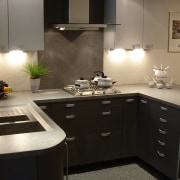 Kitchen with charcoal coloured cabinetry, stone-look benchtop, splashback cabinetry, countertop, cuisine classique, interior design, kitchen, room, black