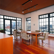 View of the dining room, wooden flooring, ceiling architecture, ceiling, chair, daylighting, floor, flooring, furniture, hardwood, interior design, living room, loft, table, window, wood, wood flooring, red, gray