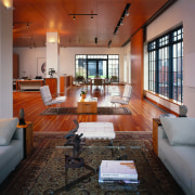 View of a living area, wooden floor an interior design, living room, real estate, room, table, gray, red