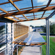 View of the building from up in the daylighting, outdoor structure, pergola, real estate, roof, structure