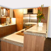 view of this kitchen showing stainless steel appliances, cabinetry, countertop, interior design, kitchen, real estate, room, white, brown