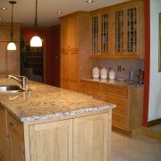 View of a kitchen are, wooden cabinetry, cream cabinetry, countertop, cuisine classique, floor, flooring, hardwood, home, interior design, kitchen, real estate, room, tile, brown
