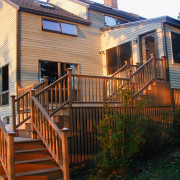 Exterior view of the wooden steps and decking cottage, deck, facade, handrail, home, house, log cabin, outdoor structure, porch, property, real estate, residential area, siding, stairs, brown, black