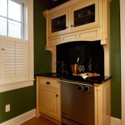 View of a wine tasting area, green and cabinetry, countertop, cuisine classique, floor, flooring, furniture, hardwood, home, home appliance, house, interior design, kitchen, kitchen stove, room, wood, wood flooring, brown