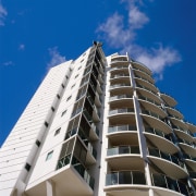view of the multistorey apartment block - view apartment, architecture, building, commercial building, condominium, corporate headquarters, daytime, facade, headquarters, metropolis, metropolitan area, mixed use, real estate, residential area, sky, skyscraper, tower block, urban area, blue