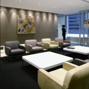 View of the client waiting area, carpet, dark furniture, interior design, black, gray