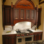 view of the elaborate kitchens showing unque timber cabinetry, countertop, estate, furniture, home, interior design, kitchen, room, brown