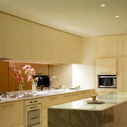 Kitchen with cream cabinetry, stone island, built in cabinetry, ceiling, countertop, interior design, kitchen, property, real estate, room, brown, orange