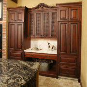 view of this kitchen showing timber cabinetry and cabinetry, countertop, cuisine classique, floor, flooring, furniture, hardwood, interior design, kitchen, room, wood stain, brown, orange