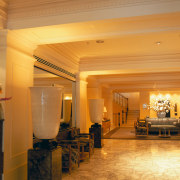 Lobby area with ornate columns and ceiling mouldings. ceiling, estate, flooring, function hall, home, interior design, lobby, real estate, room, orange, brown