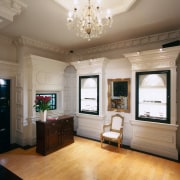 View of a jewllery showroom, wooden floor, white ceiling, floor, flooring, home, interior design, living room, room, wall, wood flooring, gray, brown