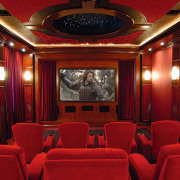 View of a family home theatre, red seats, auditorium, ceiling, conference hall, entertainment, function hall, interior design, lighting, movie theater, theatre, red