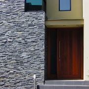view of the homestone  modulised natural stone architecture, brick, brickwork, door, facade, house, siding, wall, window, gray