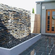 view of the this modulised natural stone  wall, window, gray